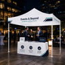 Plain white canopy tent at an evening event