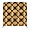 A close-up of golden fabric background texture backdrop - Backdropsource