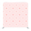 Pink  hearts on baby pink background Media wall - Backdropsource