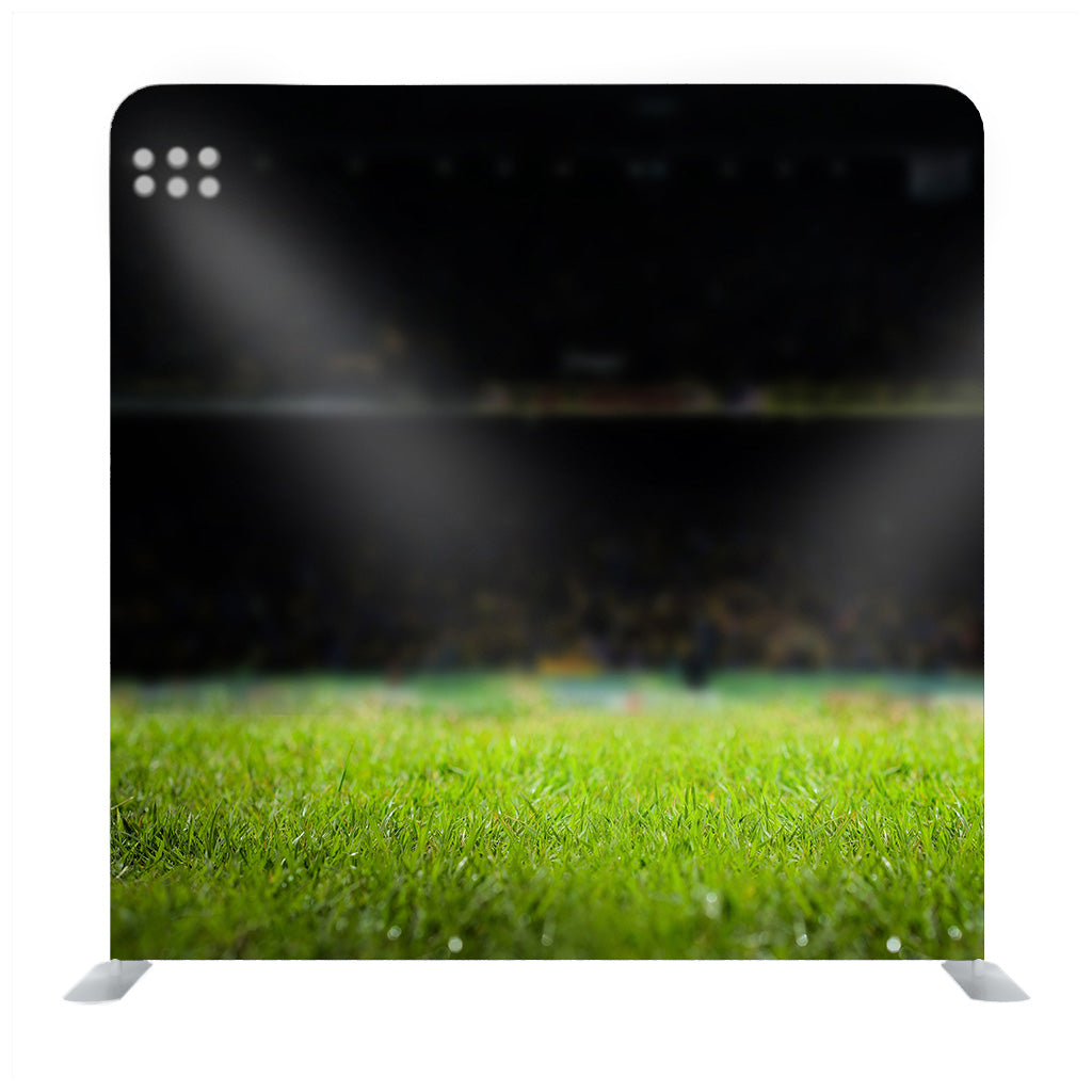 Soccer stadium lights focus on the grass Media wall - Backdropsource